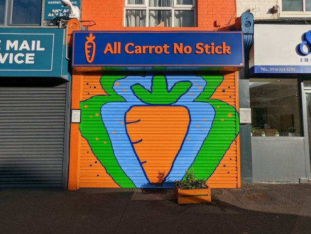 Shop shutters painted with a carrot