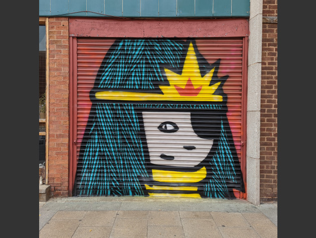 Painted shutters featuring a female character wearing an eye patch
